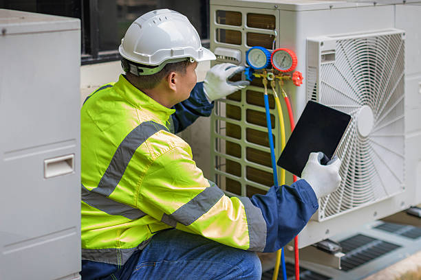 Professional Hvac Maintenance technician working in Pinehurst, MA